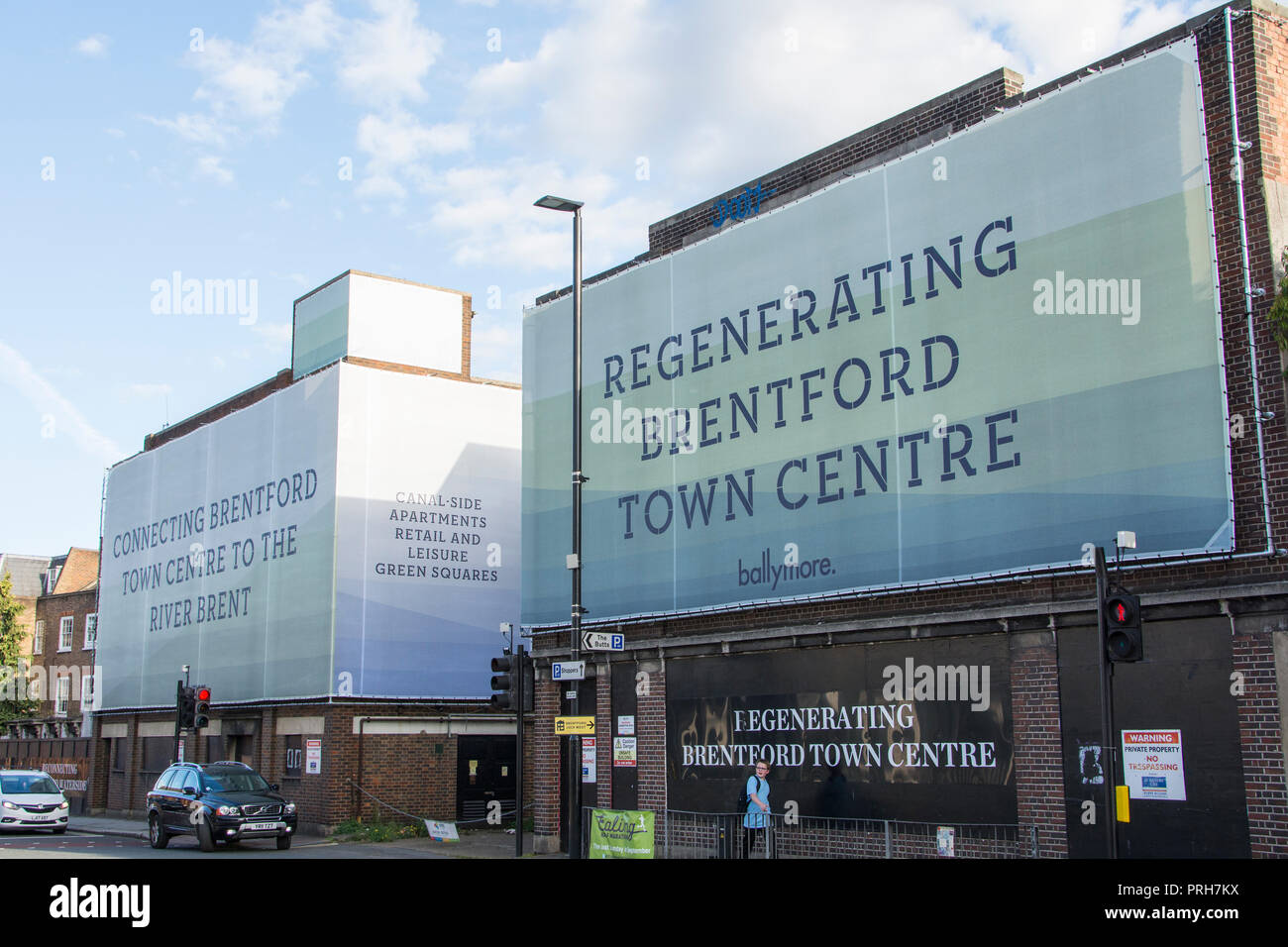 A Ballymore 'Regenerating Brentford Town Centre' hoarding on Brentford High Street, Brentford, London, UK Stock Photo