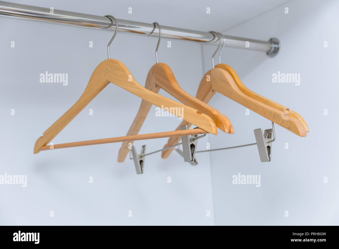 empty wardrobe with blank clothes hanger Stock Photo