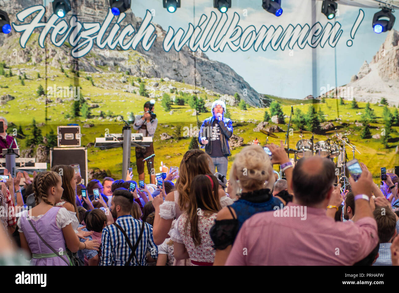 Koblenz, Germany 26.09.2018 large crowd cheers on German band singer mickie krause during largest annual Oktoberfest party featuring traditional beer, Stock Photo