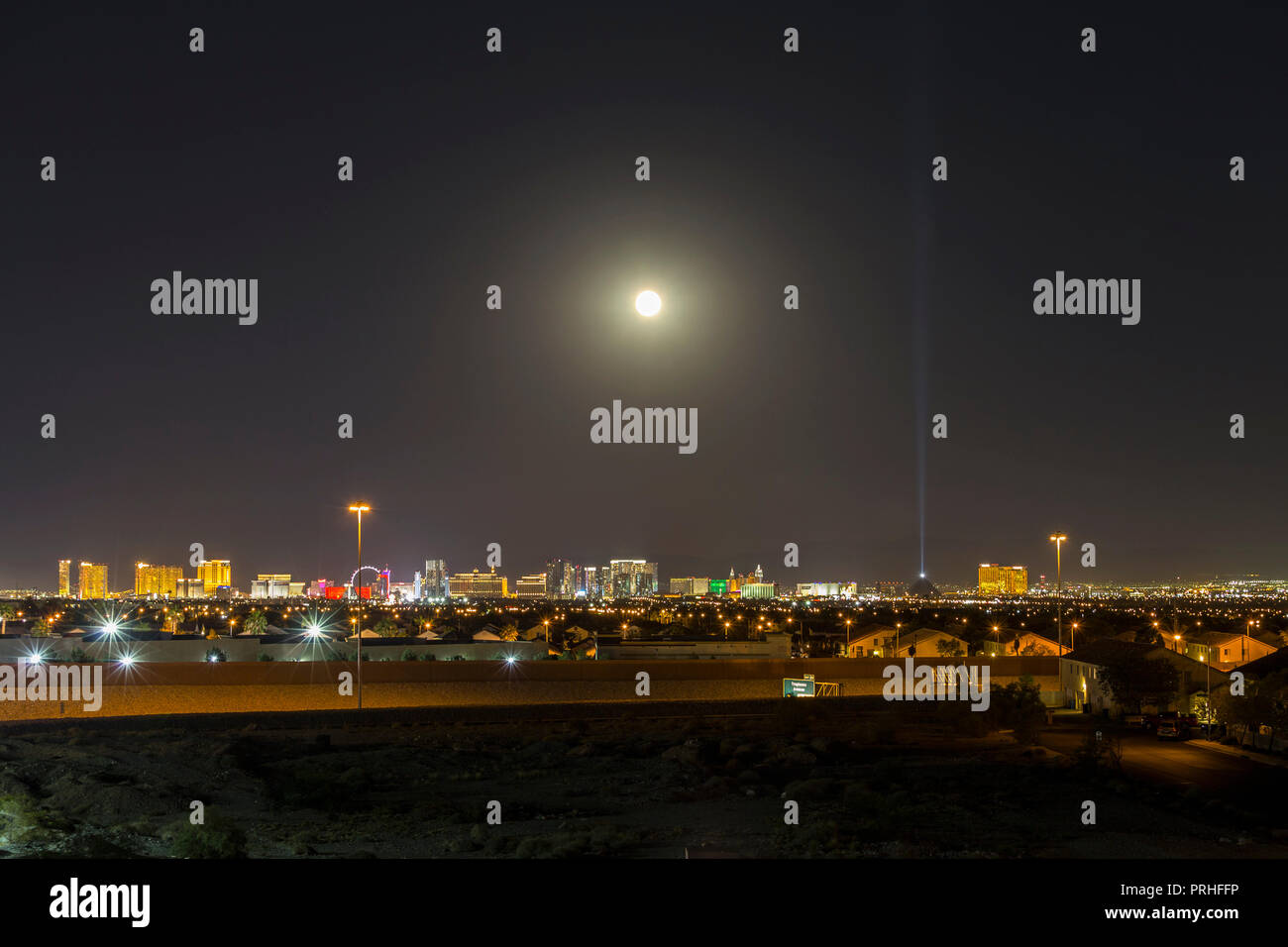 Las Vegas, Nevada, USA - September 25, 2018:  Moon rising over the Las Vegas strip resort towers in Southern Nevada. Stock Photo
