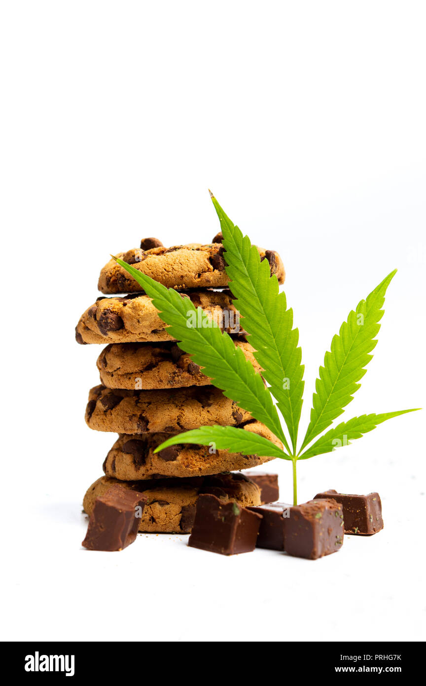 Chocolate chip cookies with marijuana isolated on white background