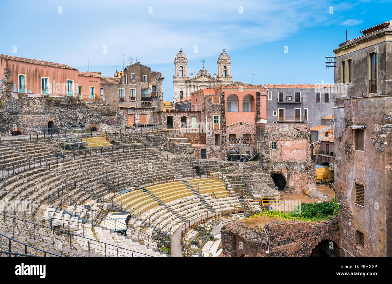 The roman theater in Catania, with the Church of St. Francis of Assisi on the background. Sicily. Italy. Stock Photo