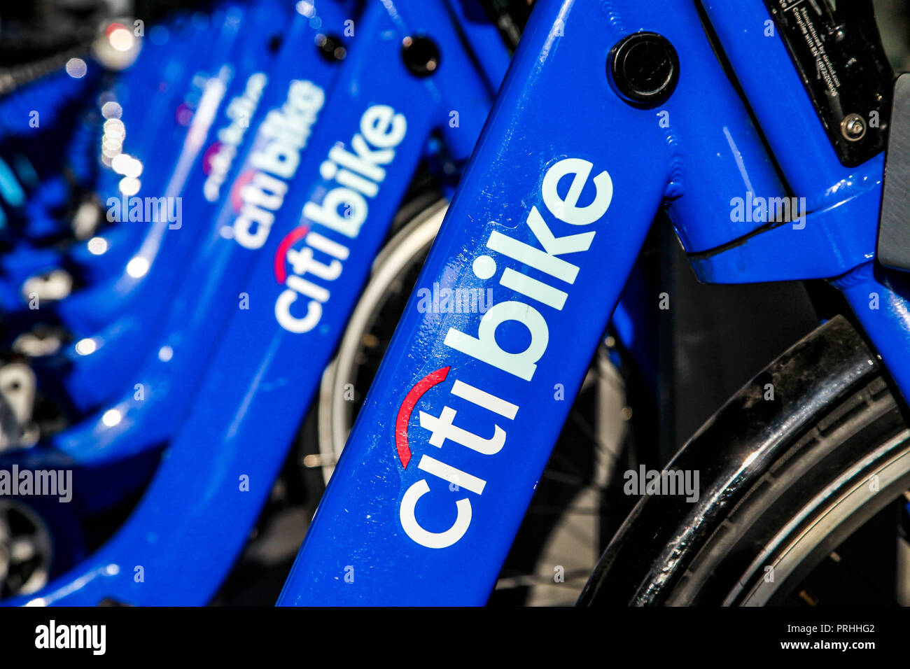 NEW YORK-NOVEMBER 6: New blue Citi Bikes lined up near Madison Square Garden at 8th Avenue in Manhattan on November 6, 2013. The Bike-Share program. Stock Photo