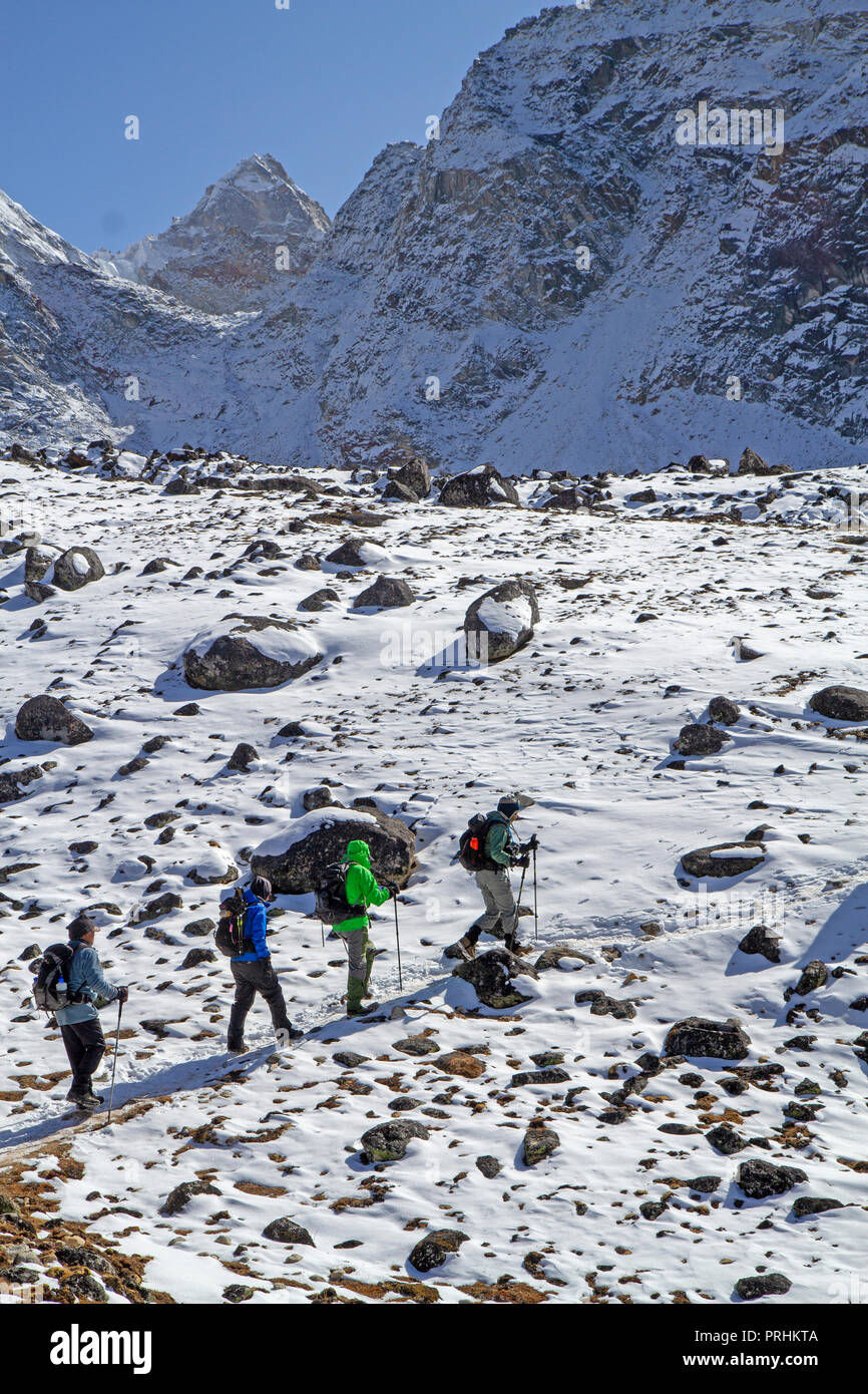 Trekkers climbing towards Cho La Stock Photo