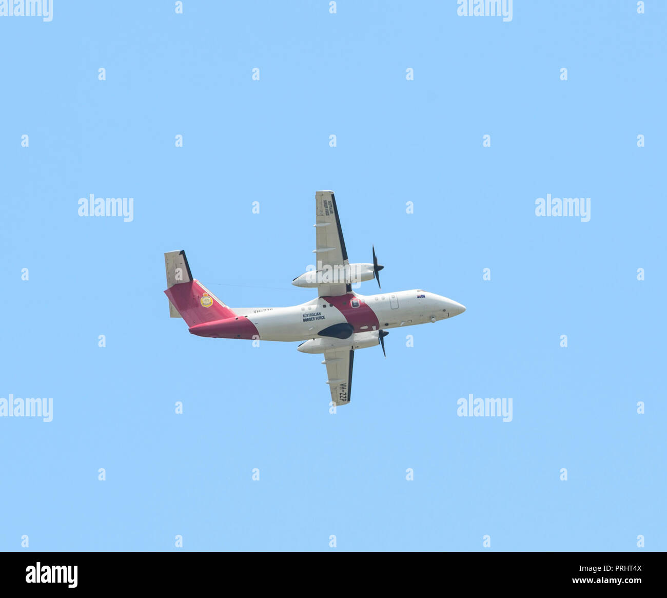 Australian Border Force VH-ZZP Surveillance Australia De Havilland Canada DHC-8-202Q in flight over Cairns, Far North Queensland, FNQ, QLD, Australia Stock Photo