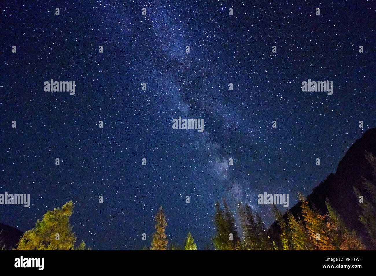 Night sky in the mountains. Milky way. Millions of stars overhead. Journey through the Altai mountains Stock Photo