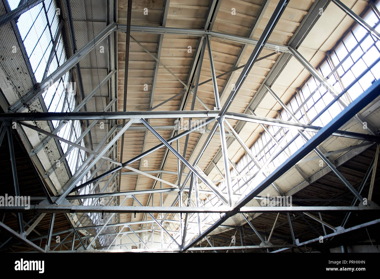 The roof of the old factory of metal and glass. That was a lot of light.Large-scale  design Stock Photo - Alamy