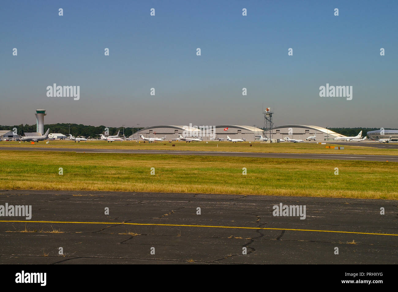 TAG Aviation hangars at Farnborough Airport with hangars, private jets
