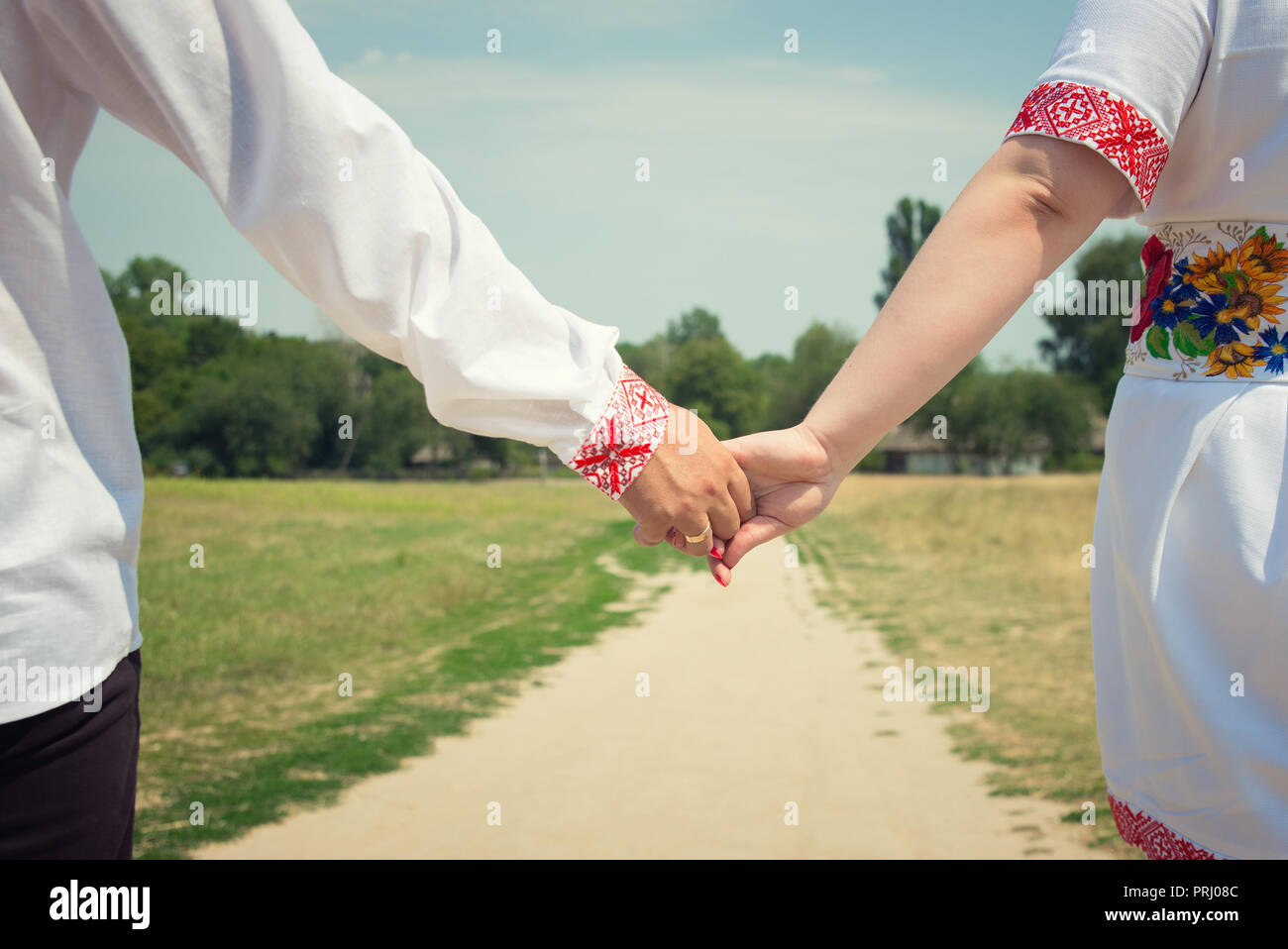 couple holding hands Stock Photo