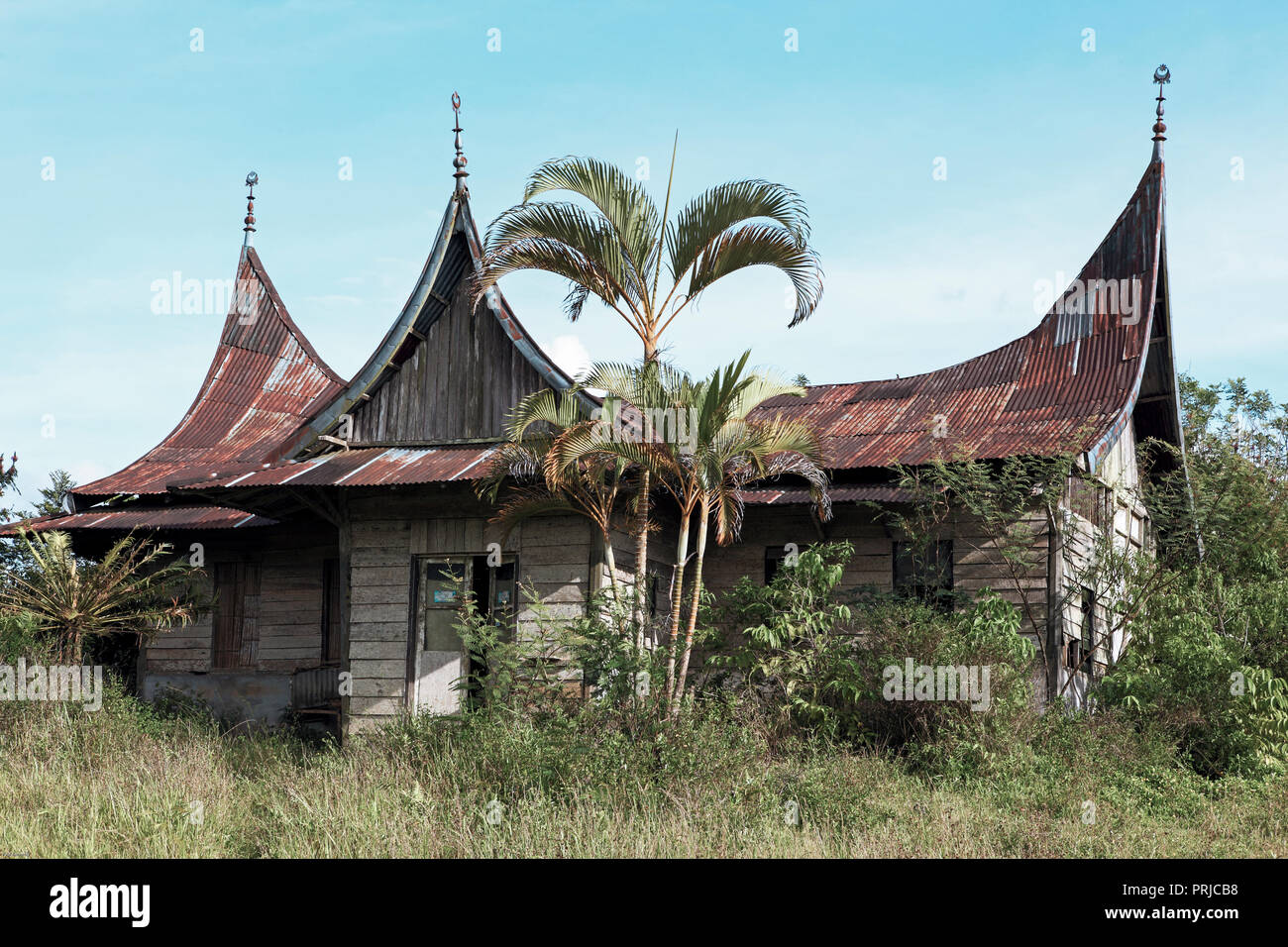 Derelict minangkabau house near Bukittinggi, Sumatra, Indonesia Stock Photo