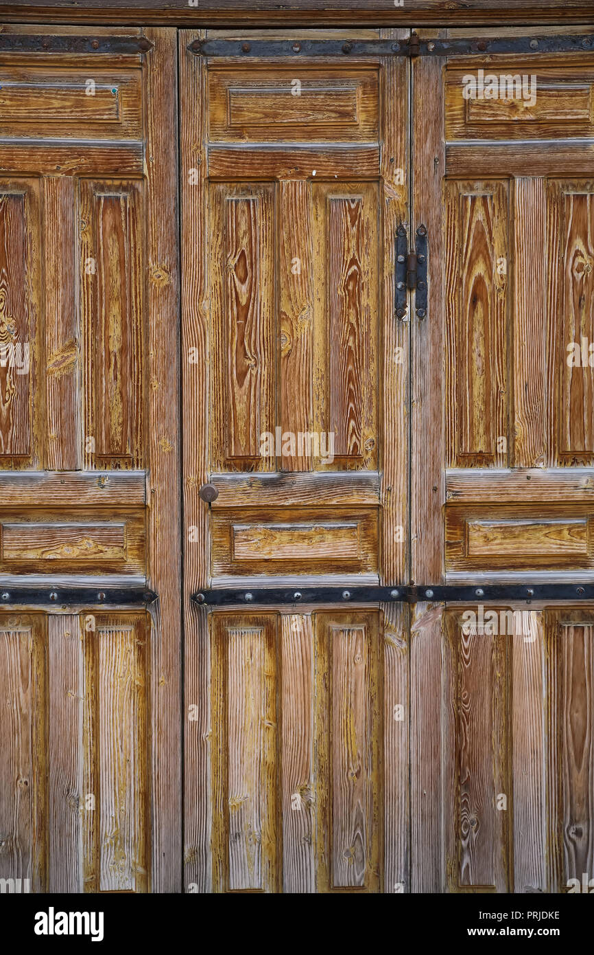 An Old Wooden Vintage Door Of A Historic Building Stock Photo