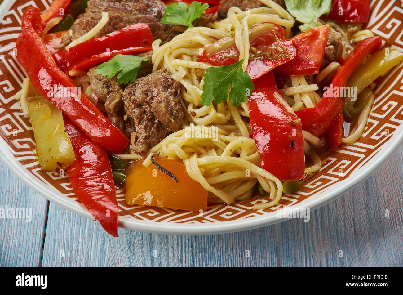 Uyghur laghman noodles, Uyghur cuisine,  Asia Traditional assorted dishes, Top view Stock Photo