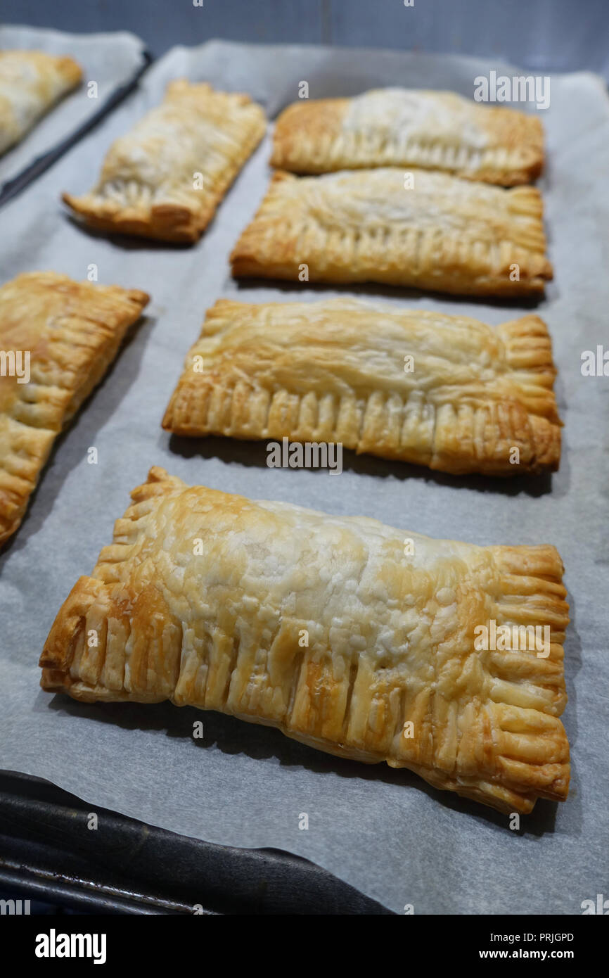 Freshly baked puff pastry on a baking tray Stock Photo Alamy