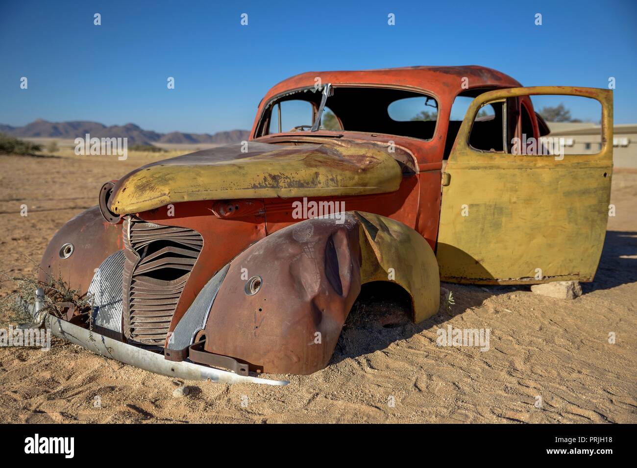 Oldtimer in the sand, Solitaire, Khomas region, Namibia Stock Photo