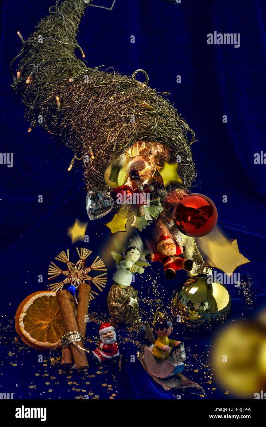 Typical Christmas decoration falls from a woven wonder horn, a symbol for Christmas, Germany Stock Photo