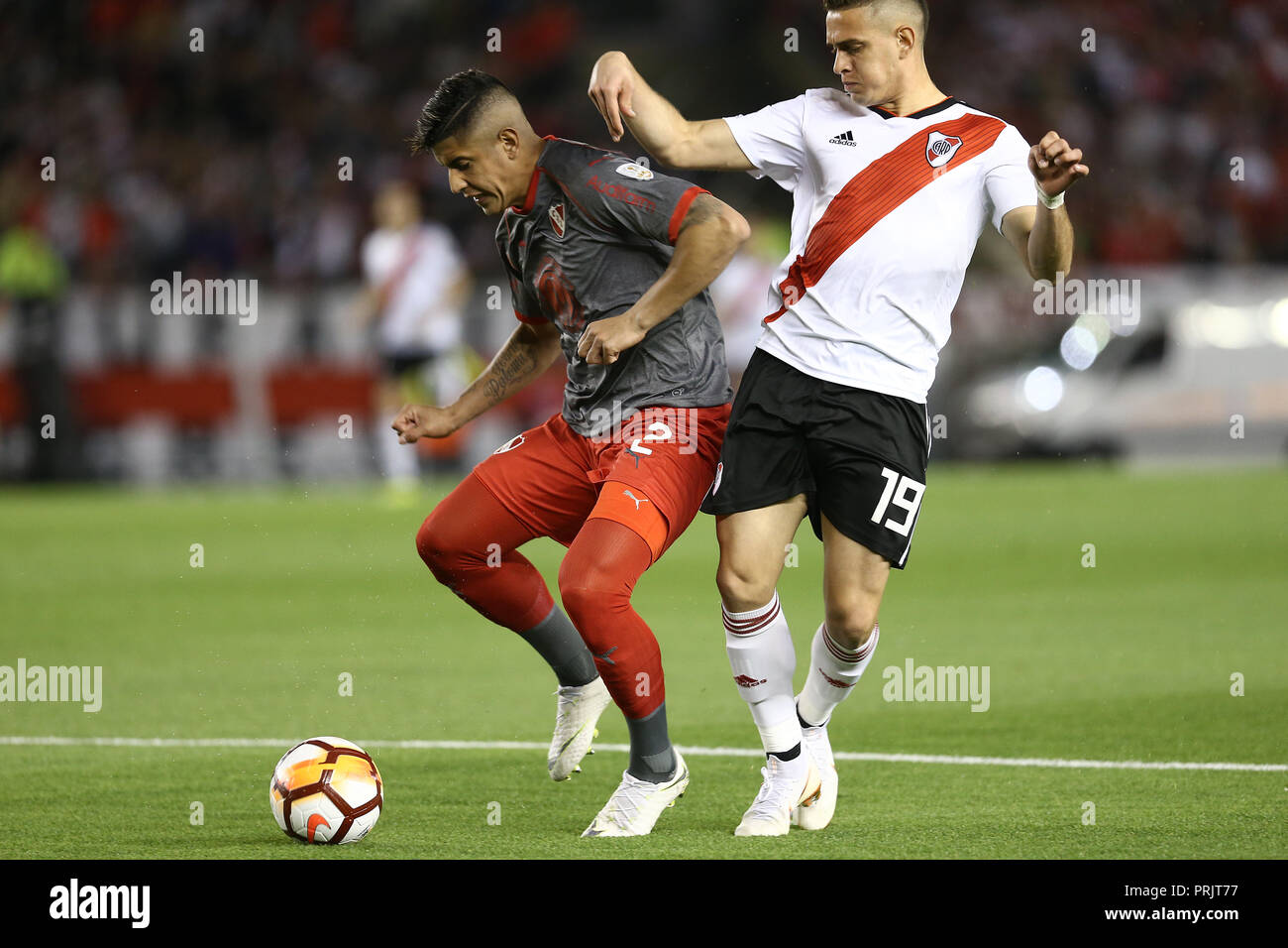 Rafael Borre (River) fighting the ball with Alan Franco (Independiente) Stock Photo