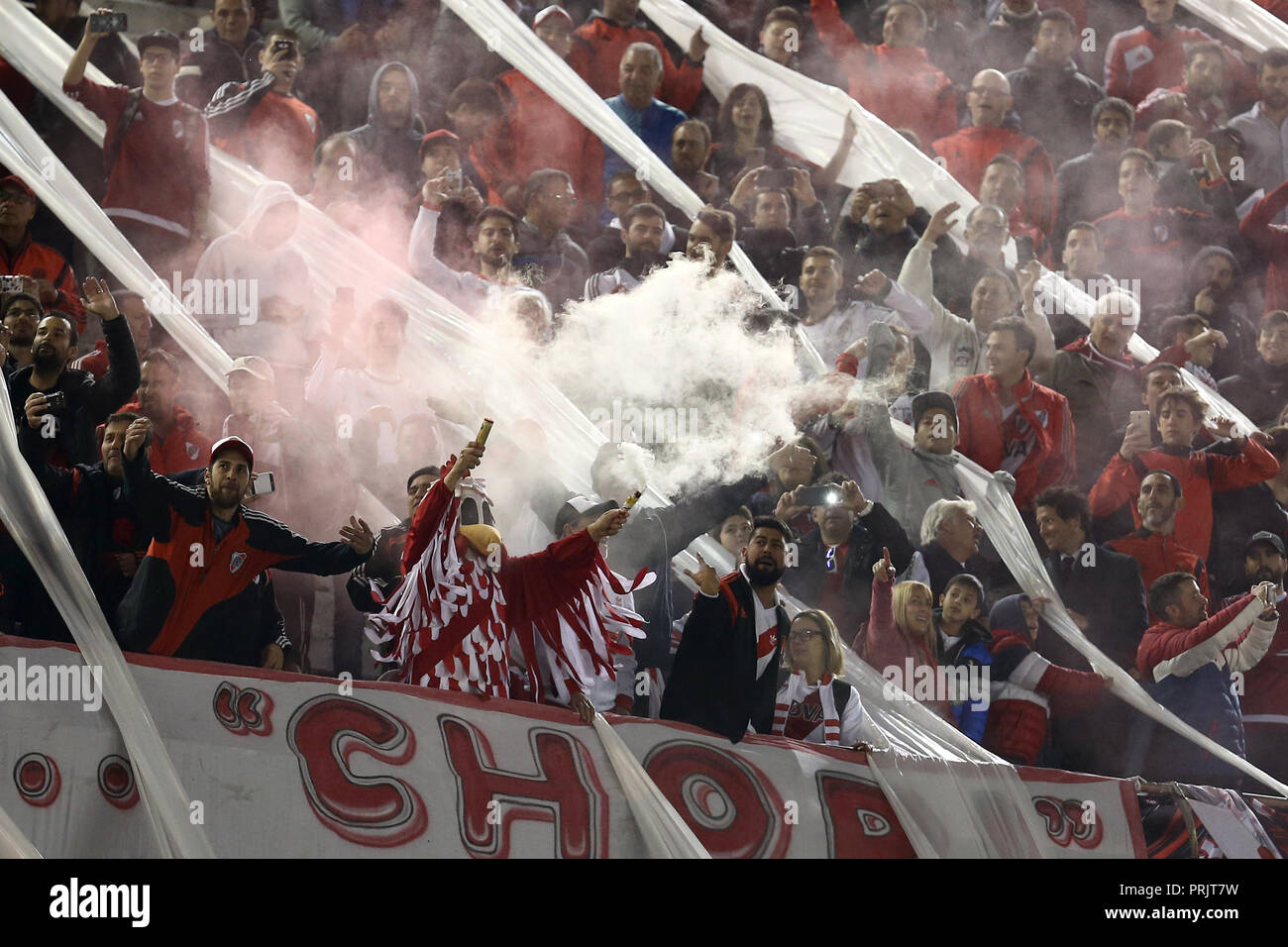 River plate fans in the beginning of the match against Independiente in Buenos Aires, Argentina Stock Photo