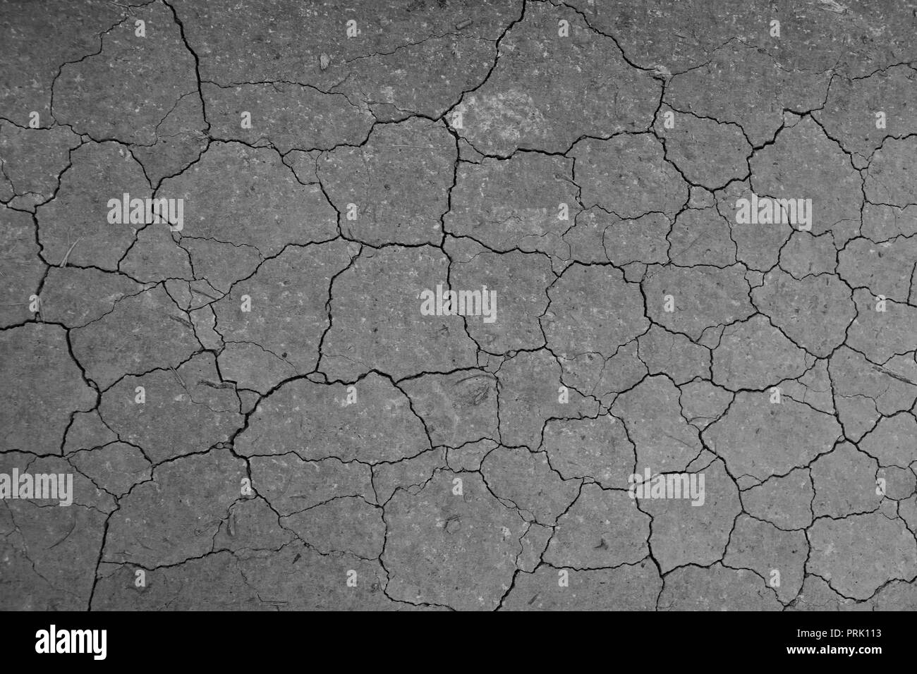 Cracked cement due to a drought. Shot taken in Italy. Stock Photo