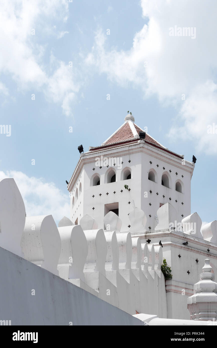 Phra Sumen Fort in Bangkok made of white stone on background of blue cloudy sky Stock Photo