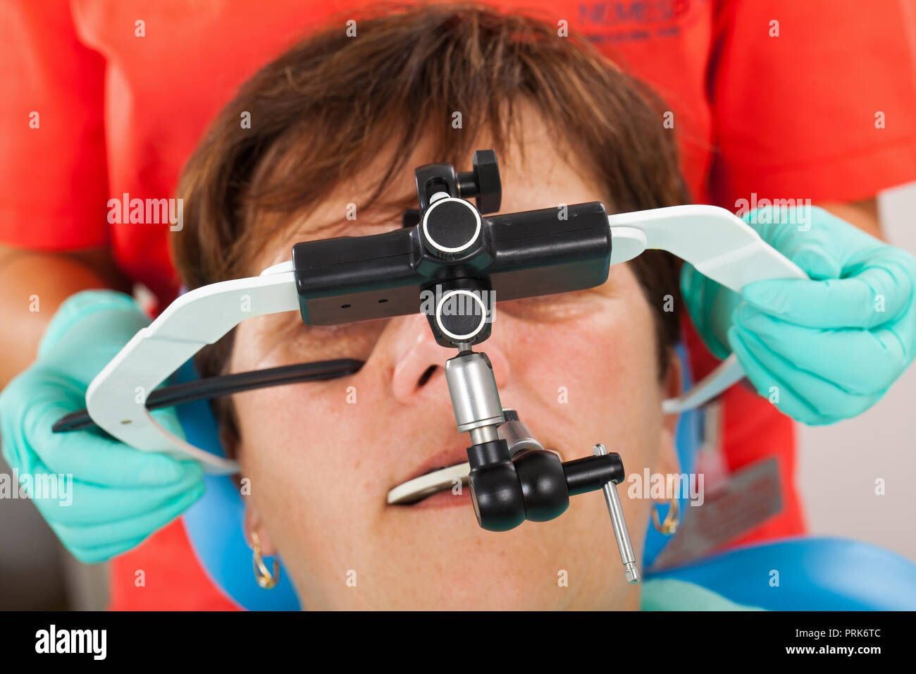 Seniorpatient wearing a facebow for transfer functional and aesthetic