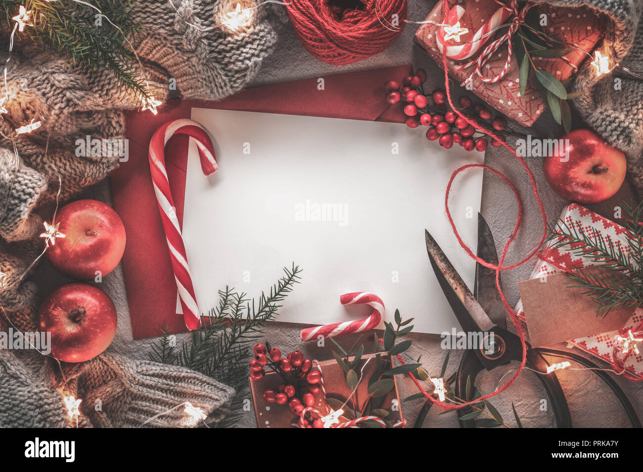 Christmas letter,fruits,gift boxes and warm sweater Stock Photo