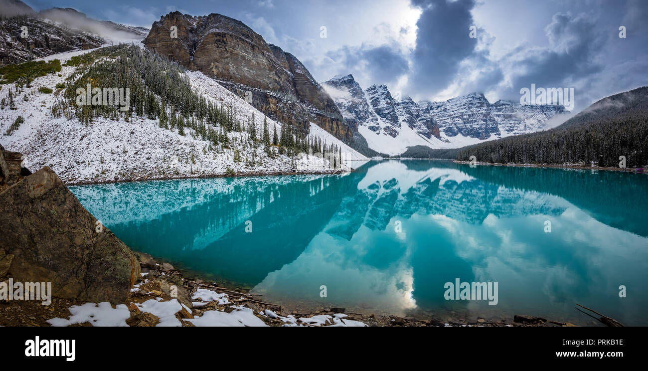 Moraine Lake is a glacially fed lake in Banff National Park, 14 kilometres (8.7 mi) outside the Village of Lake Louise, Alberta, Canada. Stock Photo