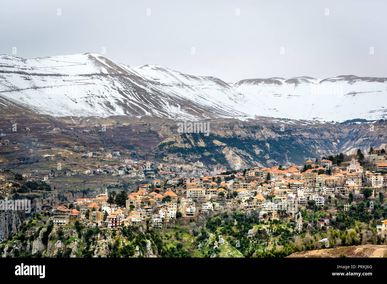 Amazing city in the valleys of the Lebanon, snowcape mountains, cloudy day, beuatiful landscape Stock Photo