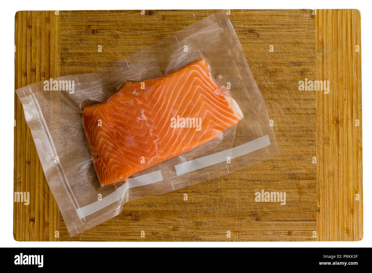 Vacuum packed fresh Atlantic salmon fillet in a transparent plastic bag