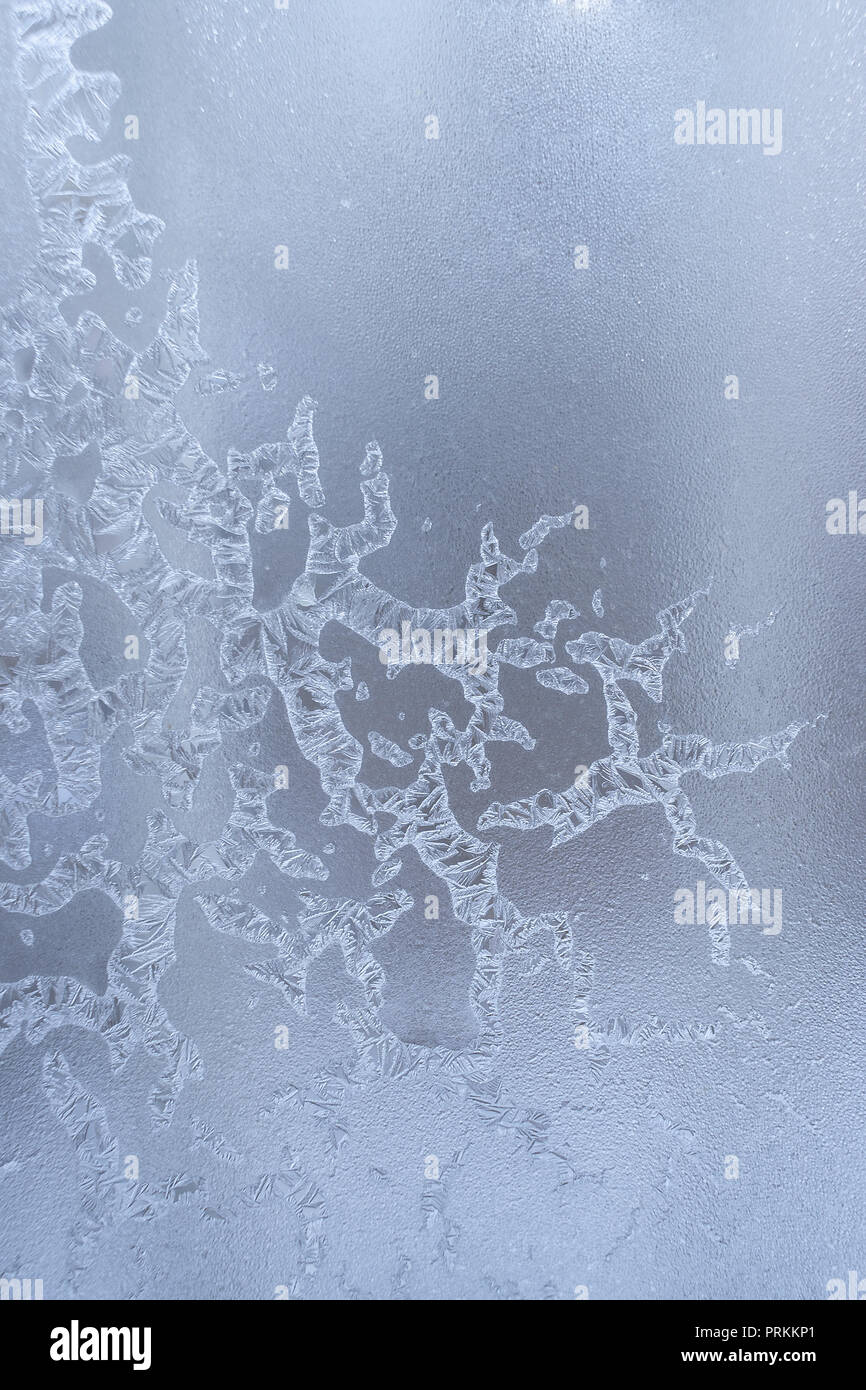 Frosty Pattern In Form Of Drawing Of Elongated Ice Crystals On Frozen Winter Window Stock Photo Alamy