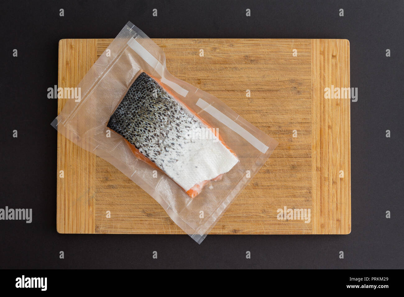 Portion of gourmet fresh Atlantic salmon in a vacuum pack of clear ...
