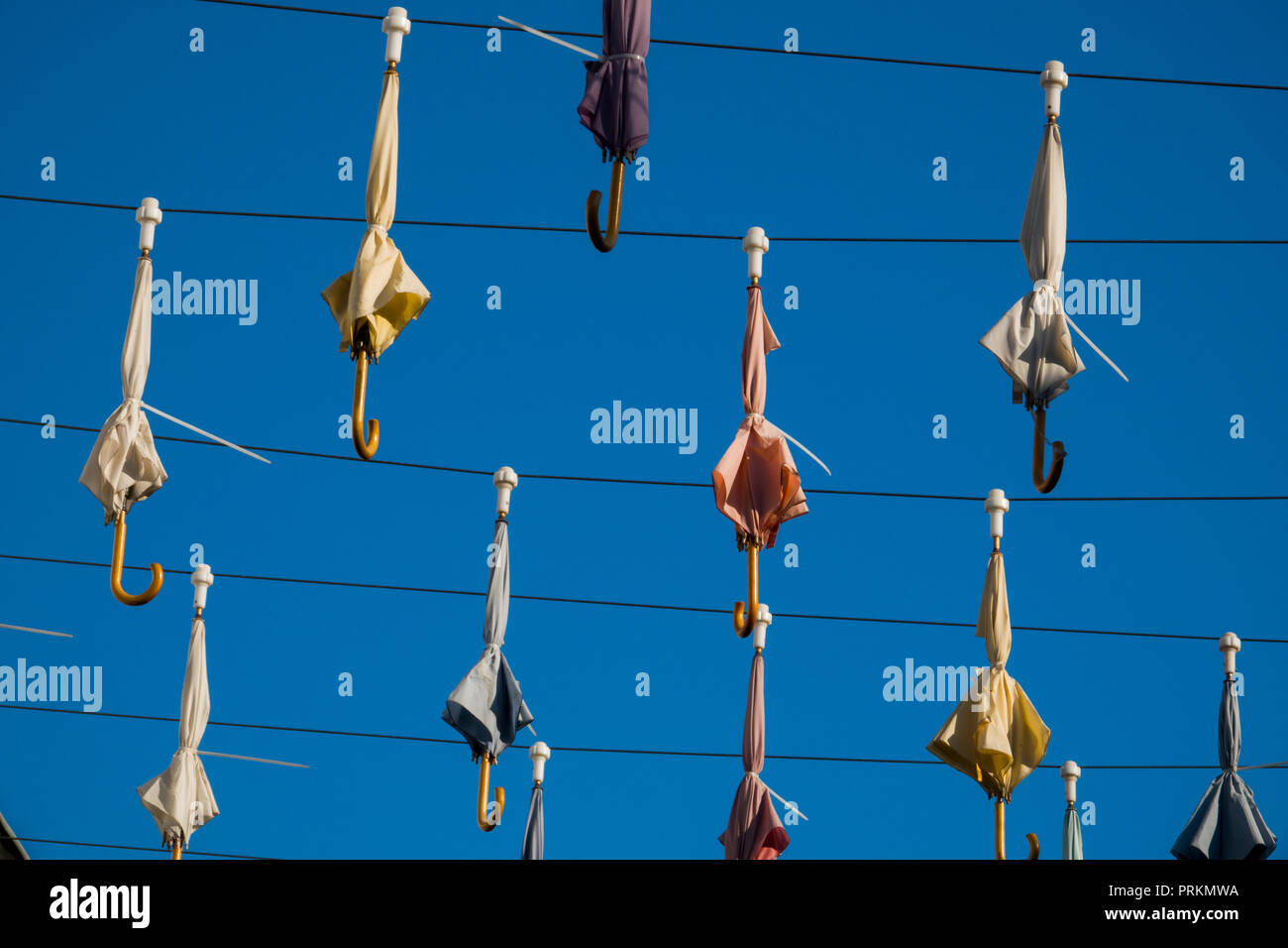 Umbrellas hanging over street in Antalya, Turkey Stock Photo