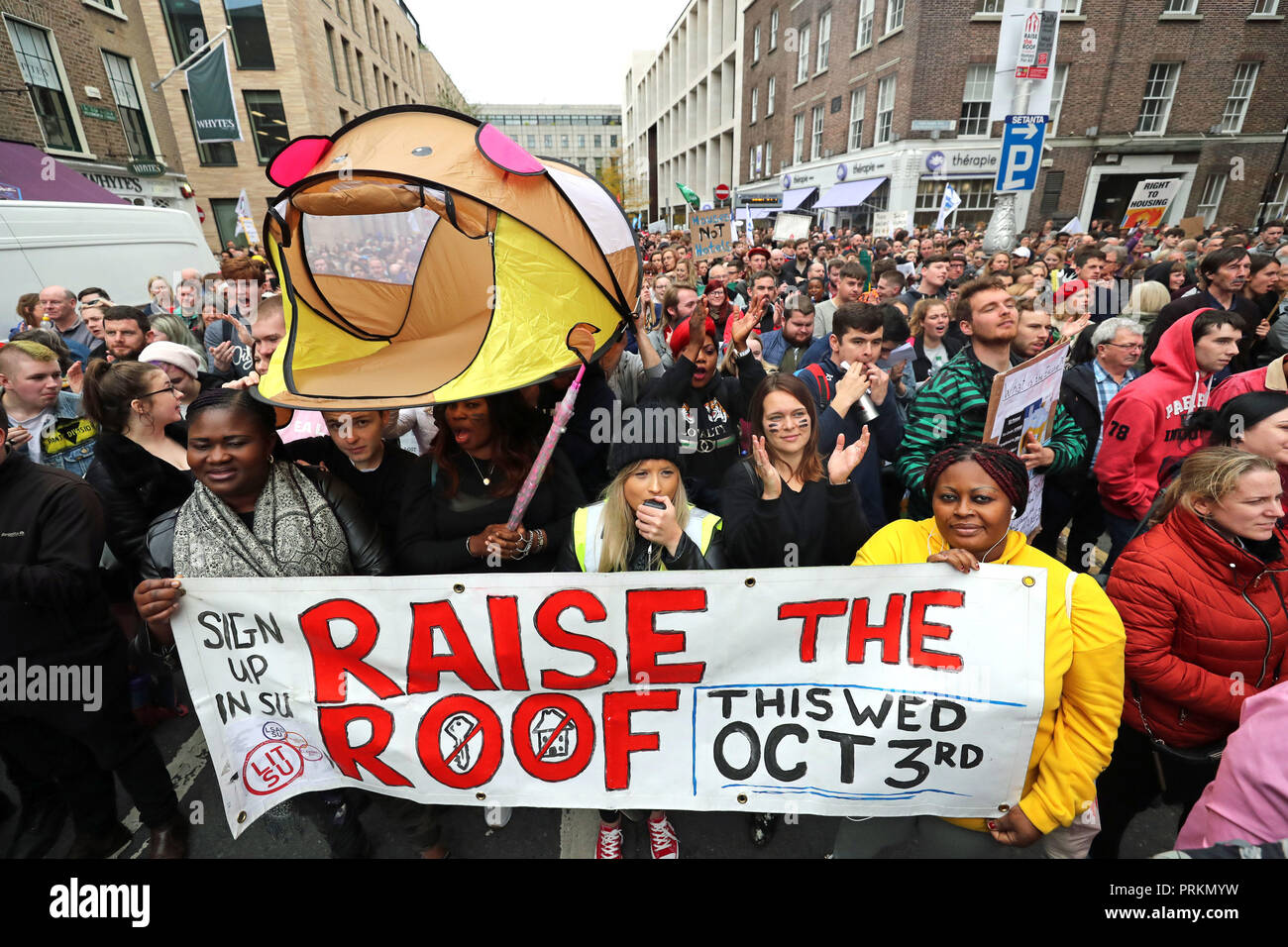 Crowds outside Leinster House in Dublin during a Raise the Roof housing rights protest. Stock Photo