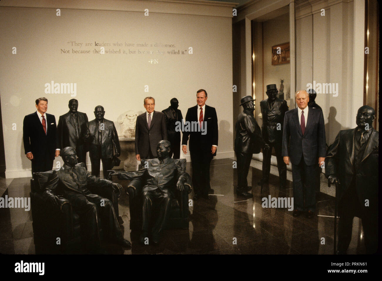 Presidents Reagan, Nixon, Bush 41, and Ford pose in  one of the exhibits  in the library at the opening of the Nixon Library on July 19, 1990.  Photograph by Dennis Brack bb24 Stock Photo