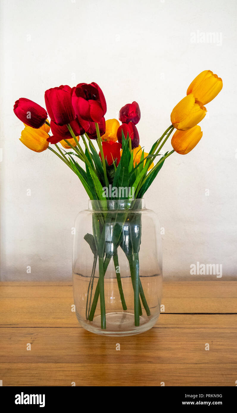 Download Red And Yellow Tulips In A Glass Jar Vase Stock Photo Alamy PSD Mockup Templates