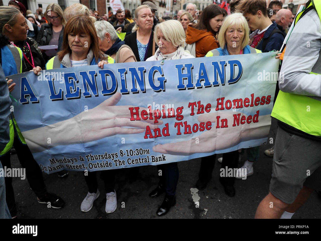 People gather outside Leinster House in Dublin during a Raise the Roof housing rights protest. Stock Photo