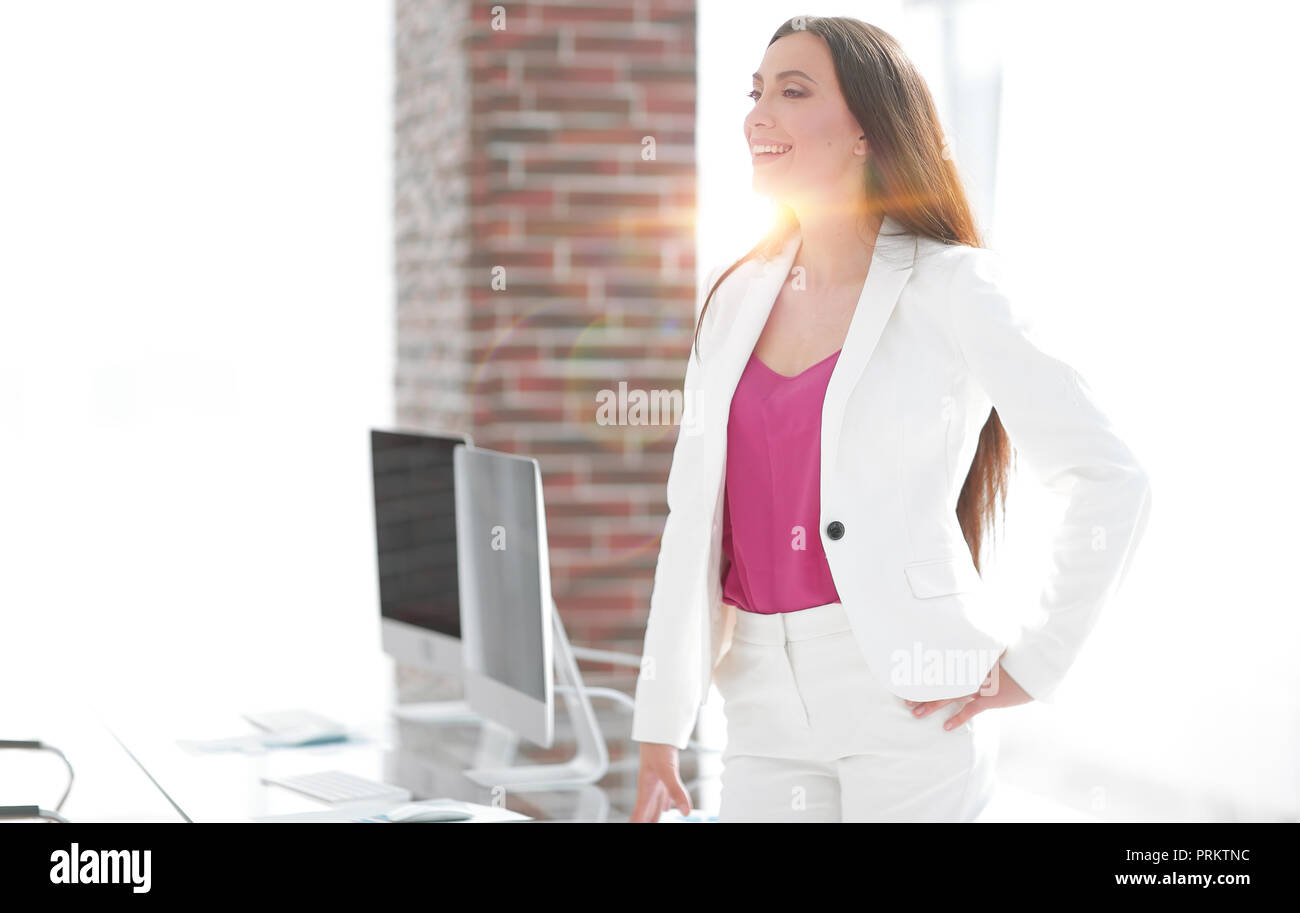 elegant business woman in a white business suit Stock Photo - Alamy