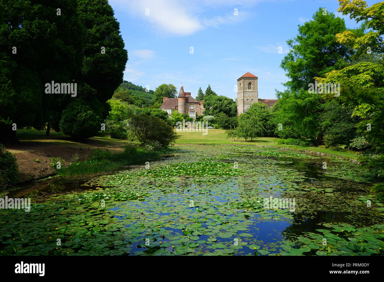 A view across the lake at Little Malvern Court Stock Photo