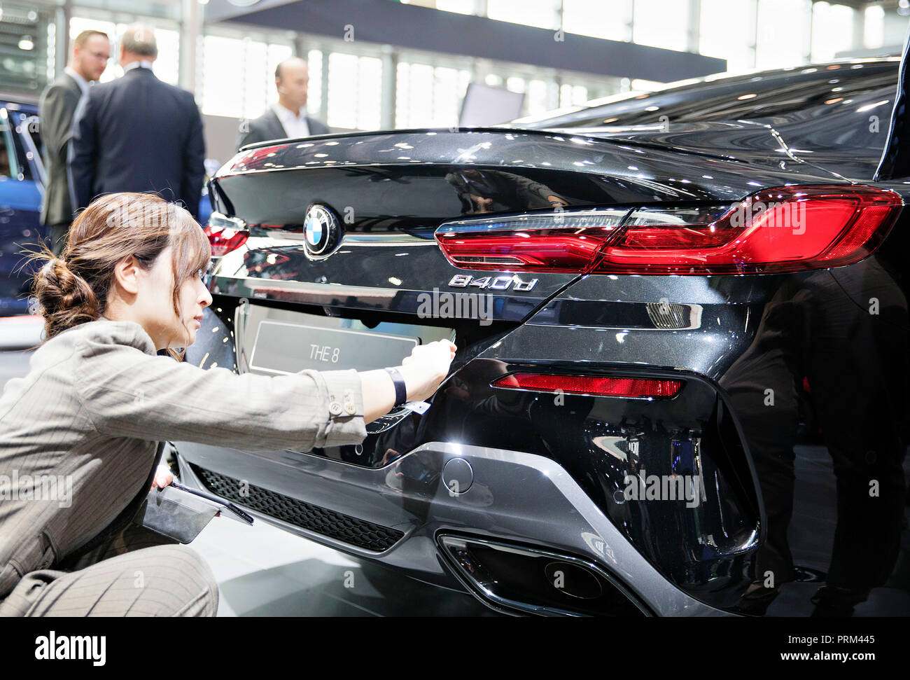 A visitor studies edges of BMW The 8 during the International Motor Show in Paris, France, on Tuesday, October 2nd, 2018. (CTK Photo/Rene Fluger) Stock Photo