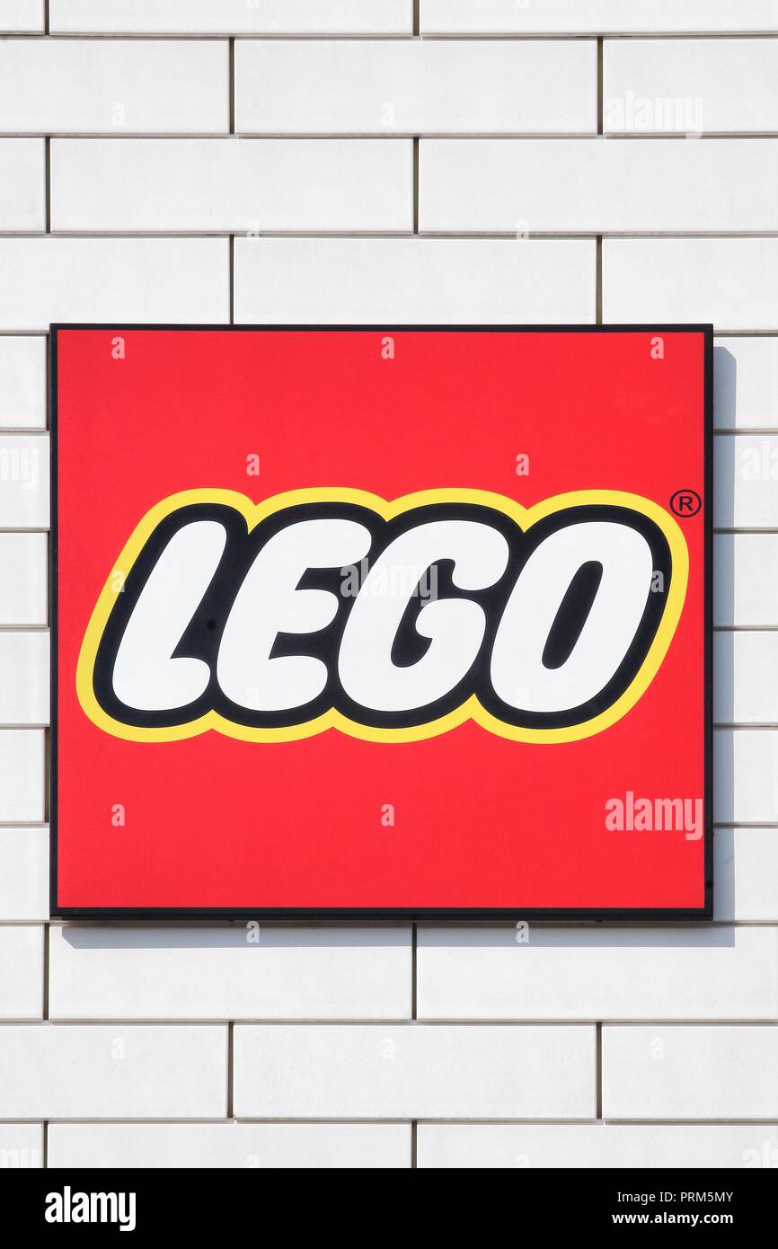Billund, Denmark - July 26, 2018: Lego sign on a wall. Lego is a line of plastic construction toys that are manufactured by the Lego Group Stock Photo