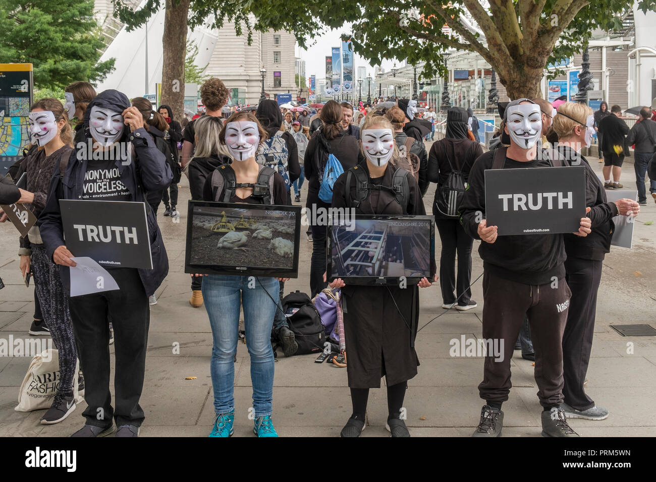Members of the activist collective Anonymous for Voiceless, an animal rights organization specialized in street activism, demonstrate in London on Aug Stock Photo