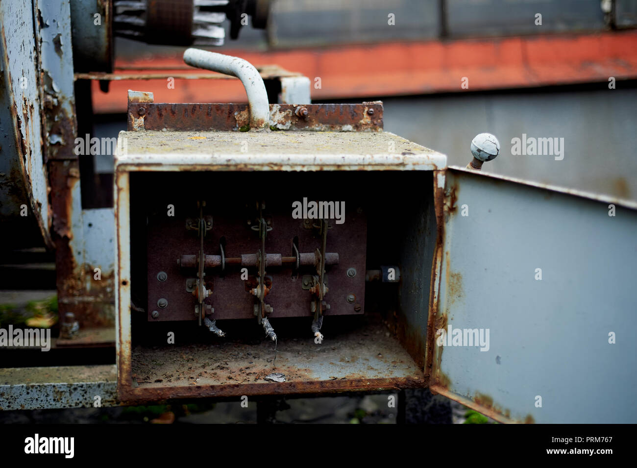 Old rusty electric shield in an abandoned building.Retro Stock Photo