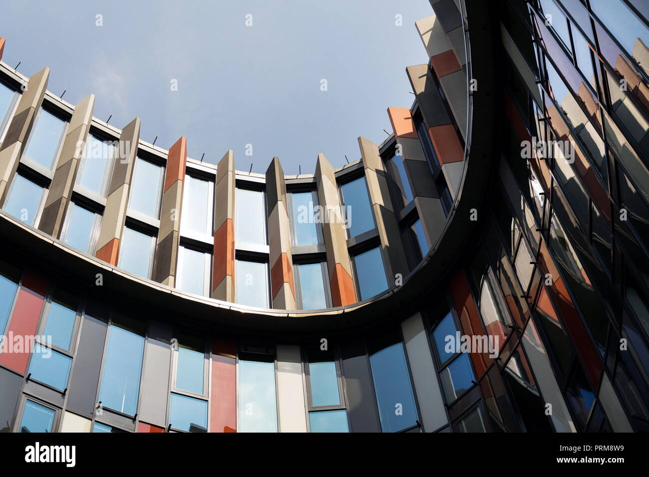 Brise soleil sun breakers on modern office building facade, global ...