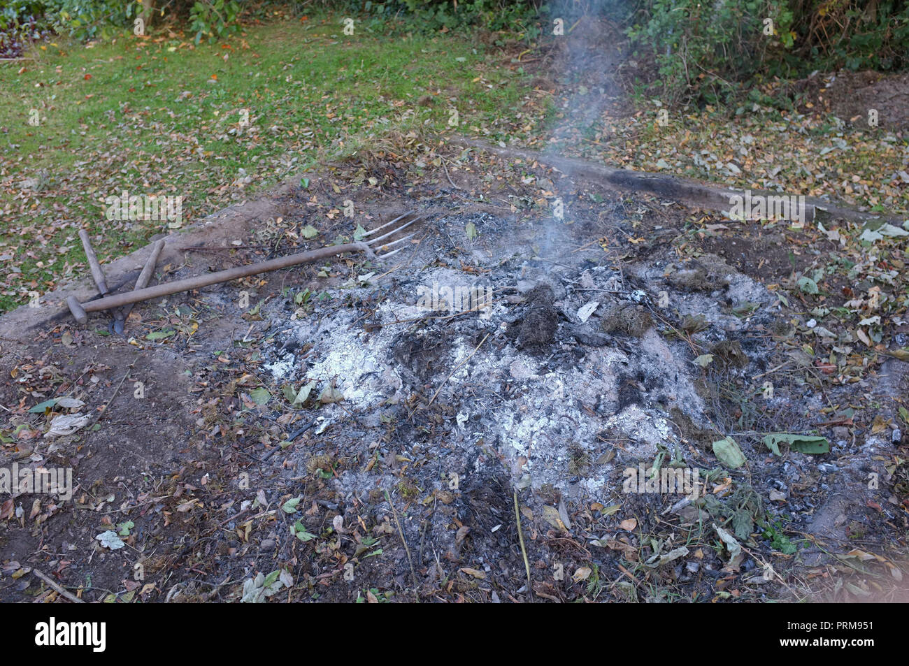A smouldering garden bonfire Stock Photo Alamy