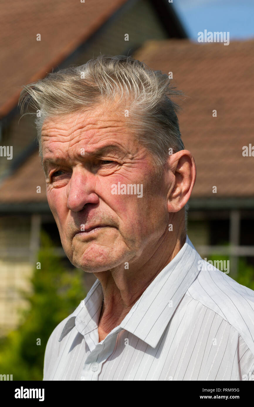 Portrait of a very old man 80 years old near his house Stock Photo Alamy