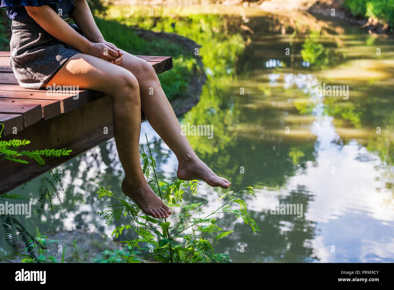 Hanging over the edge hi-res stock photography and images - Alamy