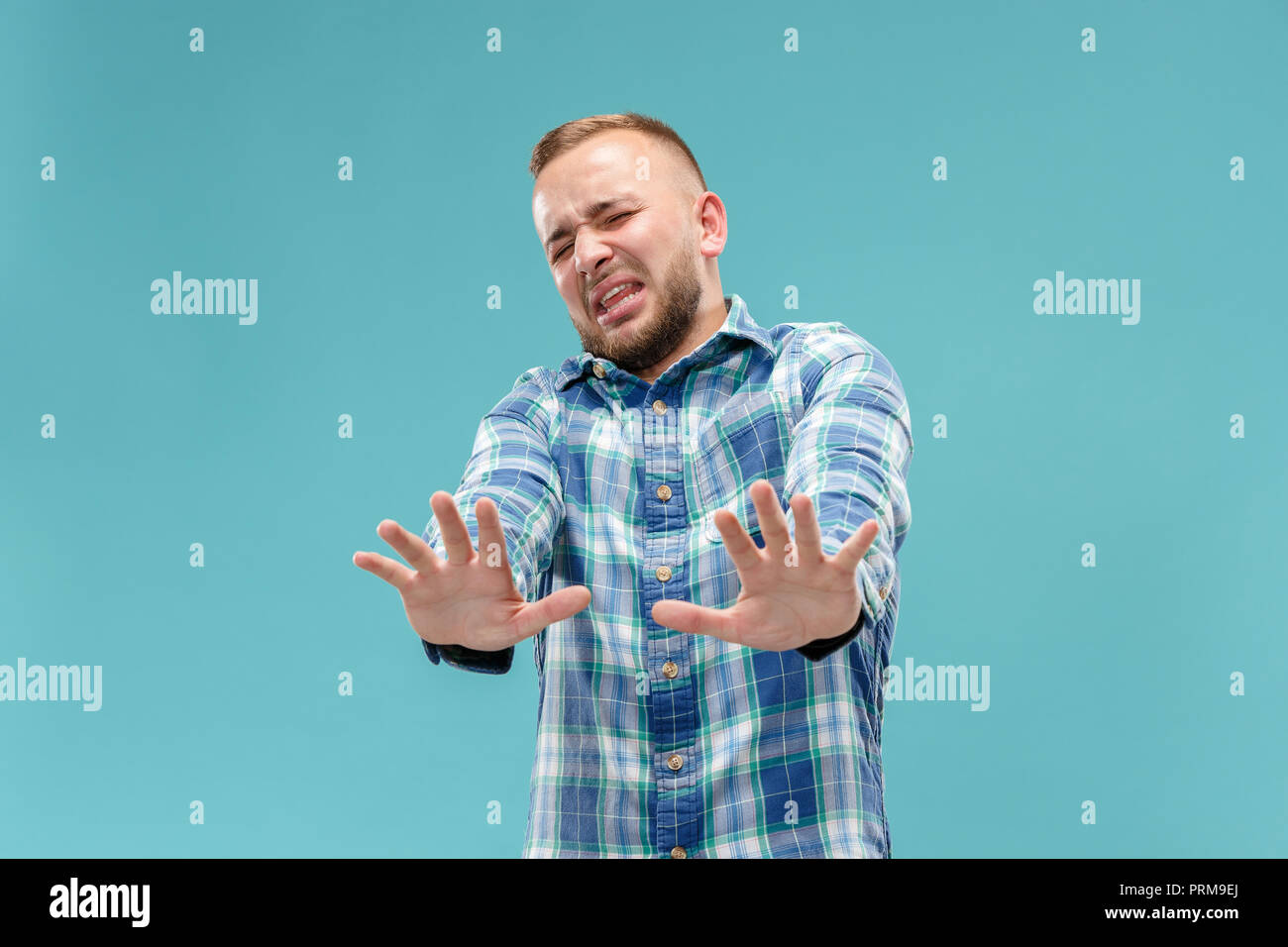 Reject, rejection, doubt concept. Young emotional man at studio. Human ...