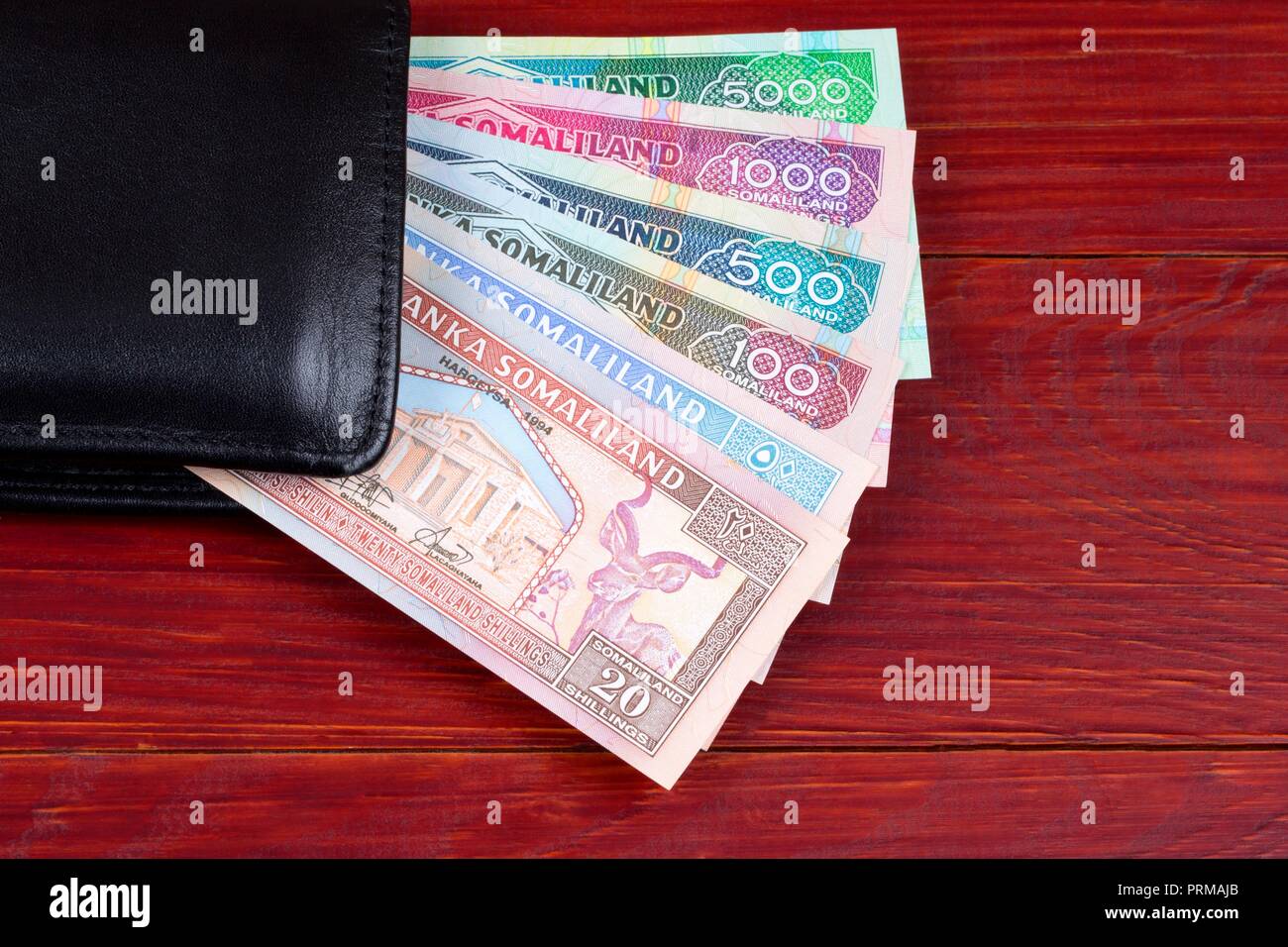 Money from Somaliland in the black wallet Stock Photo