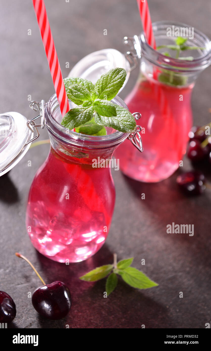 Cherry drink with ice Stock Photo Alamy