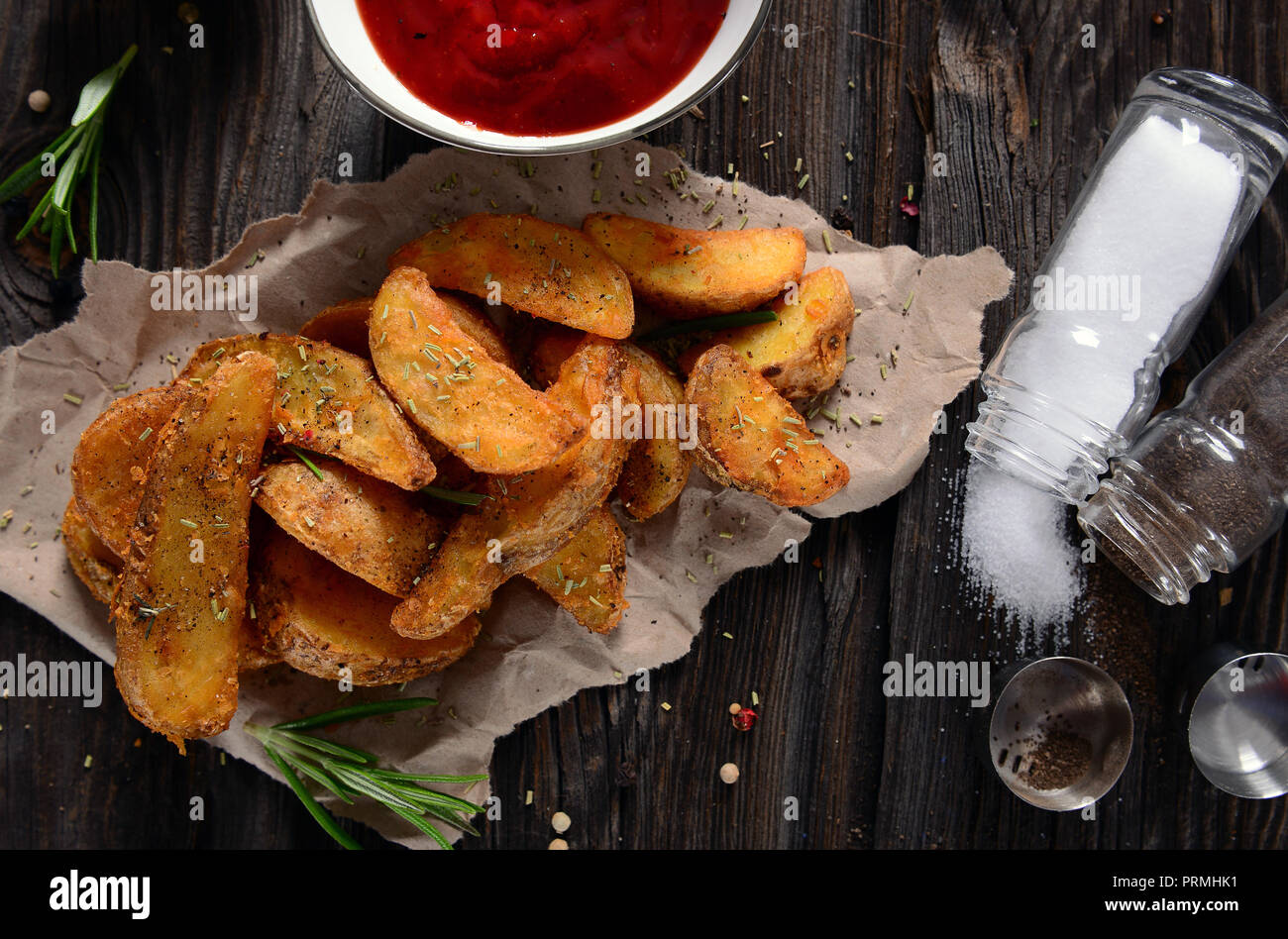 Potato wedges with herbs Stock Photo Alamy