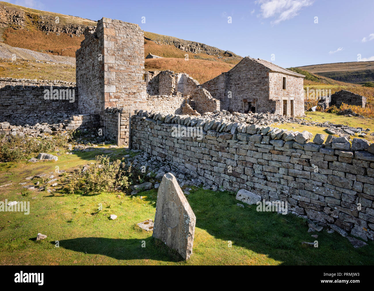 Crackpot Hall ruined stone building near Keld in Swaledale North Yorkshire. The ruin of a farmhouse was abandoned over fifty years ago. Stock Photo